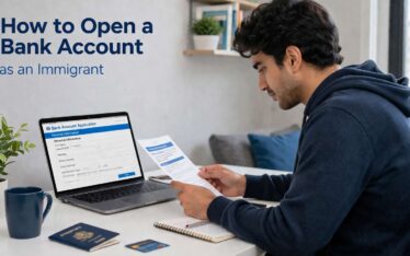 Immigrant opening bank account with laptop and documents at home desk